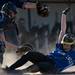 Lincoln's Cecelia Guthrie slides into home plate in the game against Skyline on Monday, May 6. Daniel Brenner I AnnArbor.com